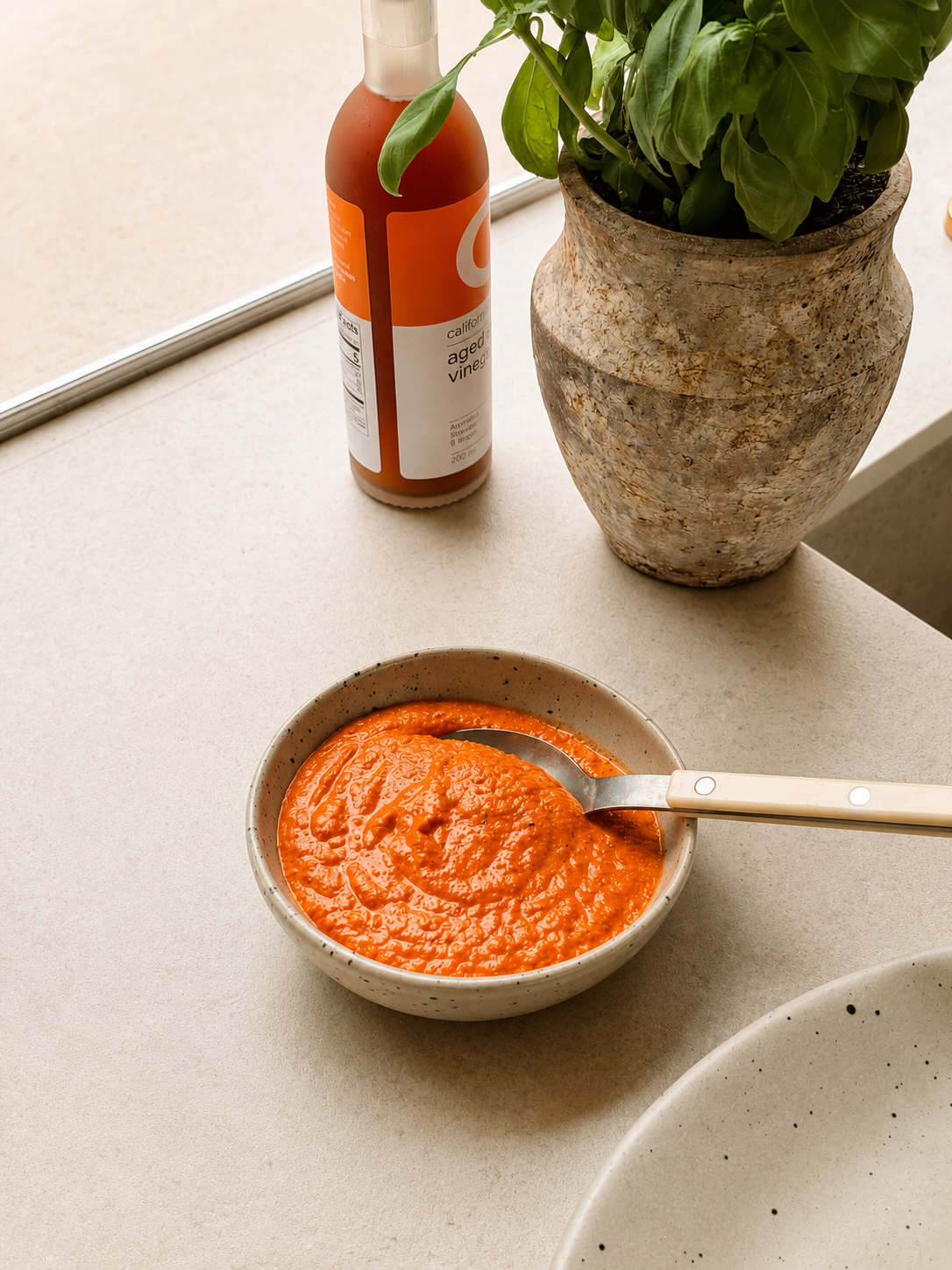Charred Shishitos with Romesco, Lemon & Herbs